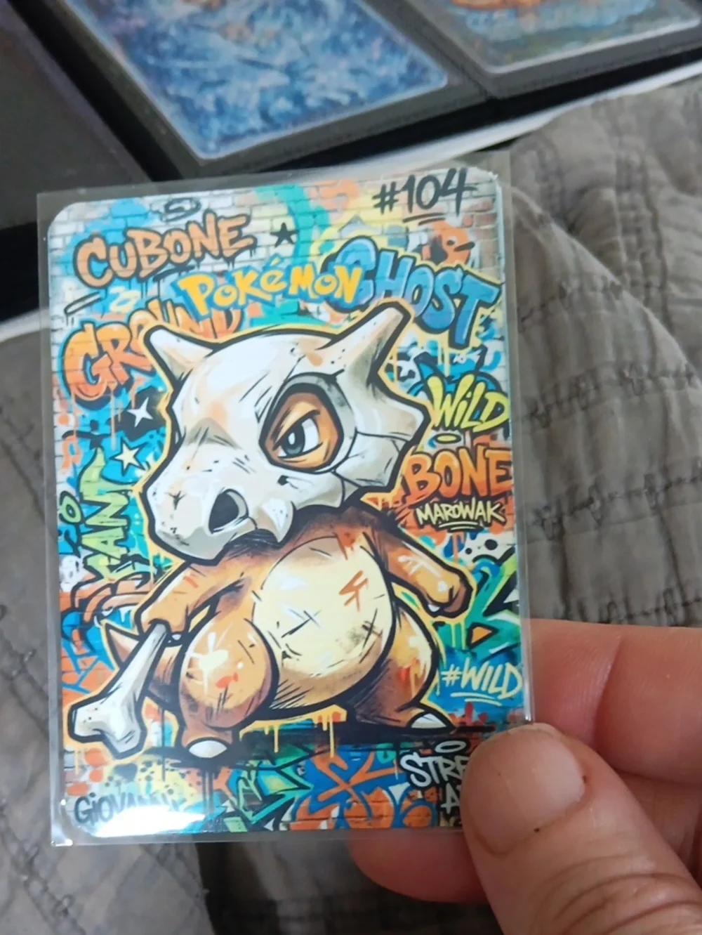 Pokemon Cubone Graffiti Card — tan, cream, blue, orange, green
